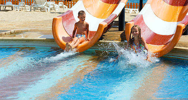 istock Children in summer outdoor pool. 476270997