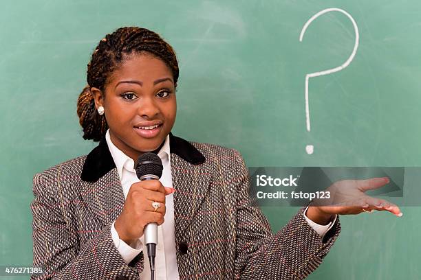 Business Businesswoman Wearing Suit Speaking To Coworker Audience Stock Photo - Download Image Now