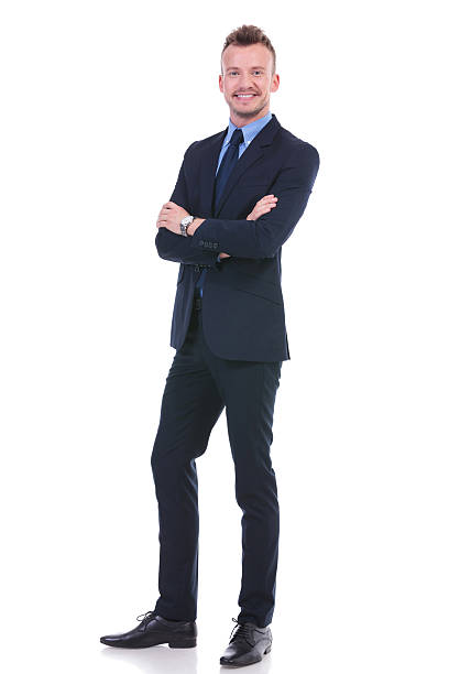 istock business man standing with arms folded 476273303