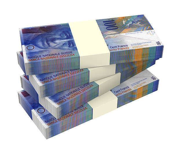 swiss soldi isolato su sfondo bianco. - swiss currency switzerland currency paper currency foto e immagini stock