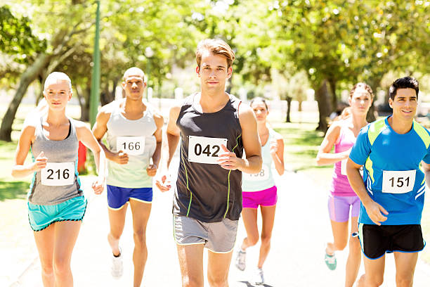 istock Portrait Of Determined Multiethnic Competitors Running Marathon 476278560