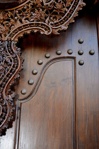 detailed of wooden window with traditional Jepara carving ornaments
