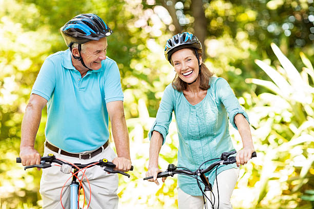 istock Active Senior Couple With Bicycles In Park 476279498