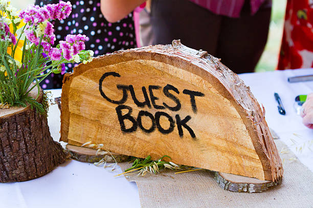 istock Crosscut Tree Guest Book Sign 476282545