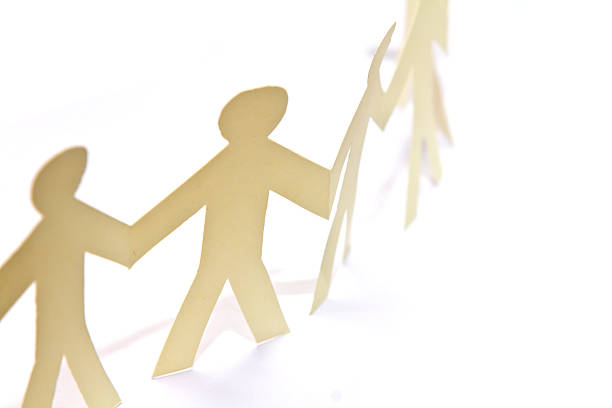 istock Cutout paper people over white background 476282611