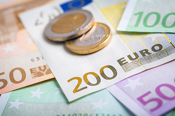 istock Closeup of euro banknotes and coins 476282902
