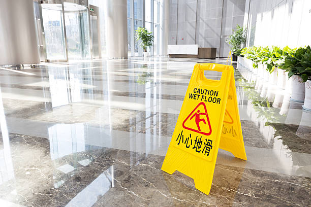 istock Sign showing warning of caution wet floor 476283461
