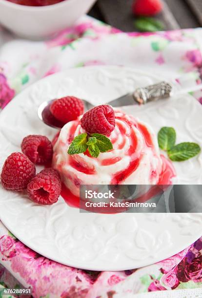 Delicious Dessert With Raspberry Sauce And Fresh Berries Stock Photo - Download Image Now