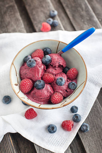 istock Berry ice cream decorated with fresh blueberries and raspberries 476288959