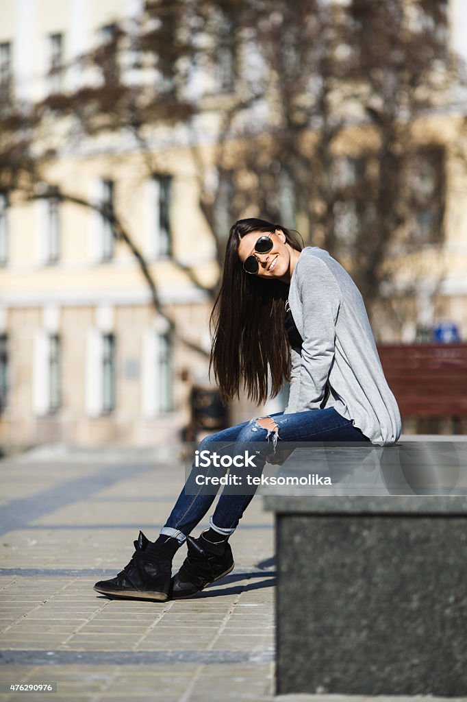 girl in the city young girl posing on a background of the city 2015 Stock Photo