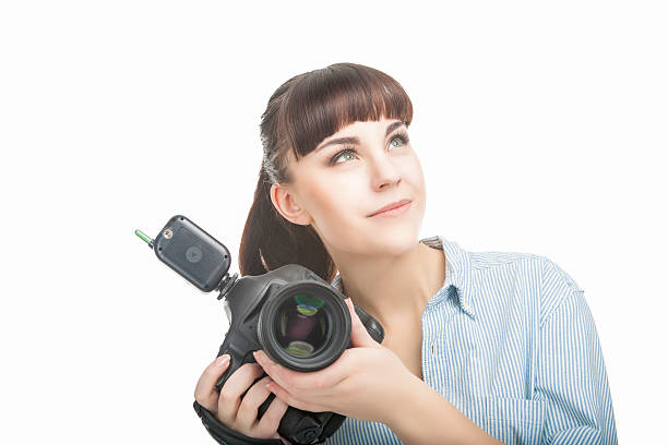 istock Young Caucasian Woman Taking Images 476292409