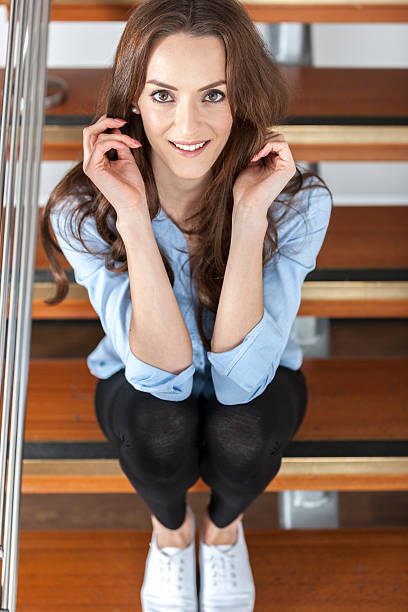 istock Woman sitting on staircase 476294380