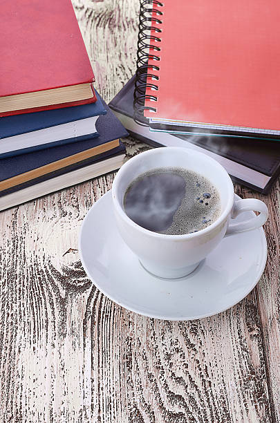 istock Cup of coffee on a wooden table 476294511