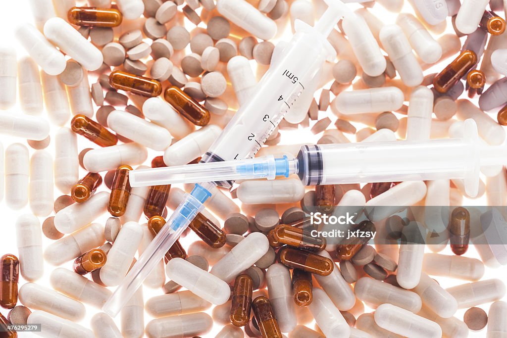 capsules with pills capsules with pills with backlight on Addiction Stock Photo