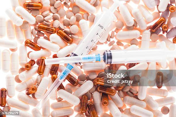 Capsules With Pills Stock Photo - Download Image Now - Addiction, Back Lit, Blue