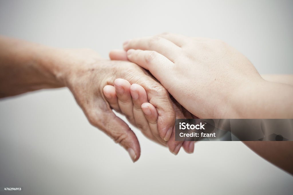 Caring comforting hands Adults Only Stock Photo
