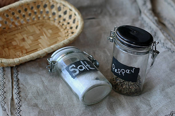 istock capacity for salt and pepper on linen background basket 476300102