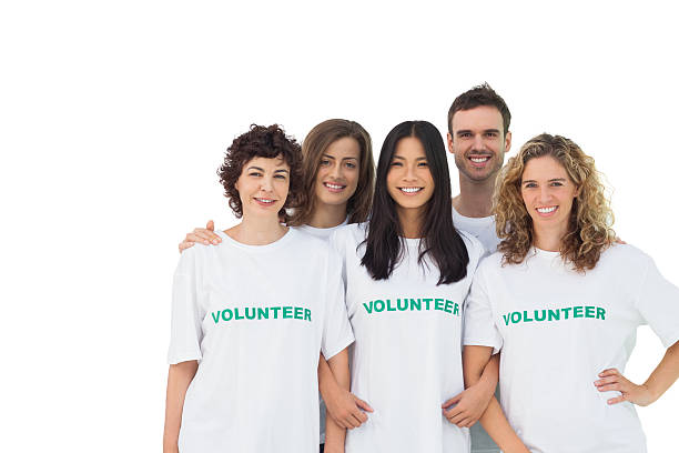 istock Smiling group of volunteers standing 476307061