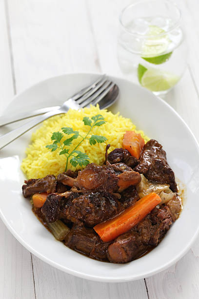 istock cuban oxtail stew with yellow rice 476308338
