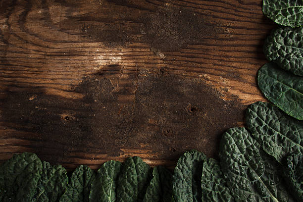 istock Black kale covering two sides of the image 476312321