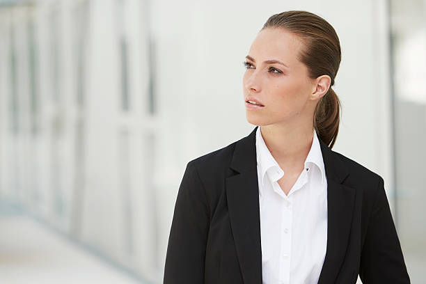 istock Young businesswoman looking away 476312739