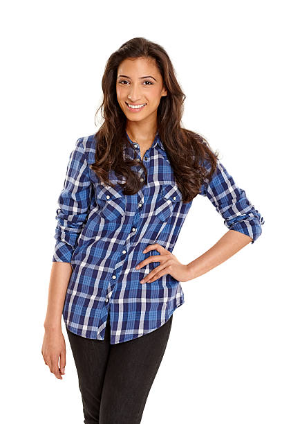 istock Cheerful young Indian girl standing on white 476313751