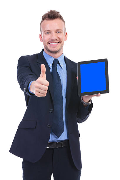 istock business man shows tablet and thumb up 476313943