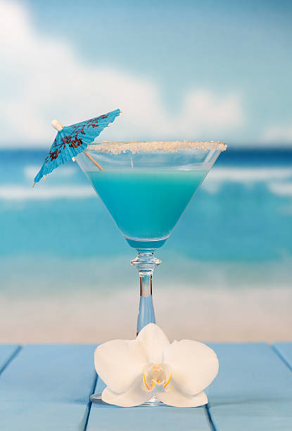 istock Cocktail with umbrella and flower 476314240