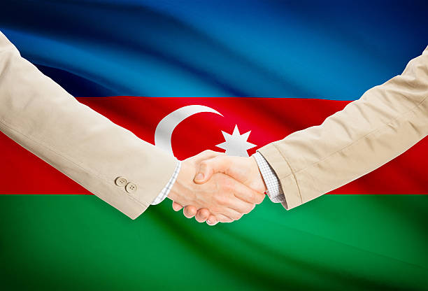istock Businessmen handshake with flag on background - Azerbaijan 476314292