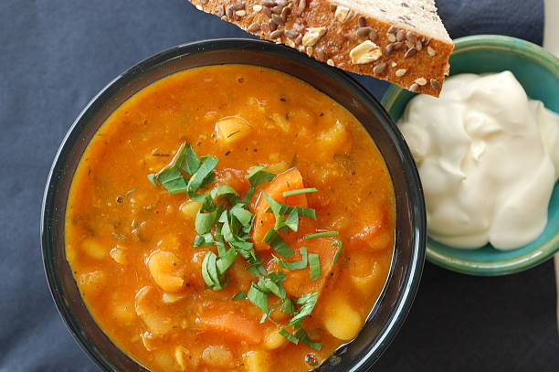 istock bean soup, bread and sour cream 476314300