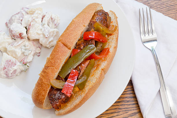 Sausage Onion Peppers Bun Fried sausage onions and red and green bell peppers on sandwich bun torpedo sandwich stock pictures, royalty-free photos & images