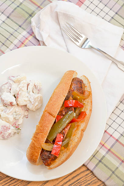 Sausage Onion Peppers Bun Fried sausage onions and red and green bell peppers on sandwich bun torpedo sandwich stock pictures, royalty-free photos & images