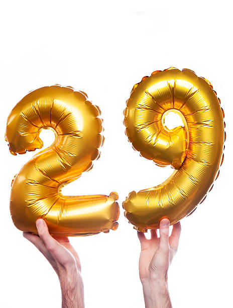 istock Gold number 29 balloons 476323426