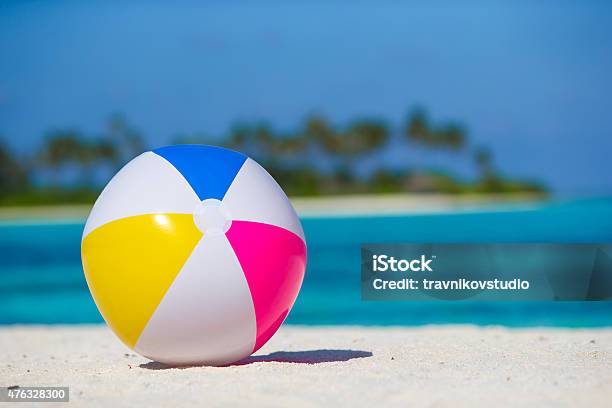 Air Ball At Beach With Turquoise Sea And Blue Sky Stock Photo - Download Image Now - Beach Ball, Sand, Beach