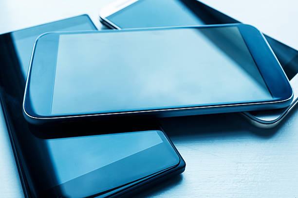 istock New mobile phones with big displays in a pile 476330730