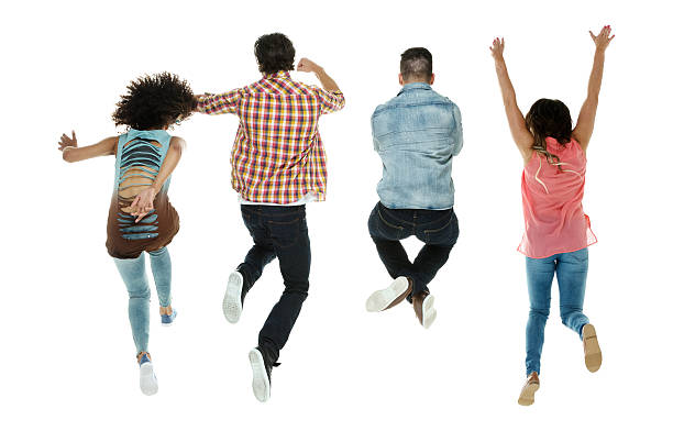 istock Rear view of four friends jumping and cheering 476331624