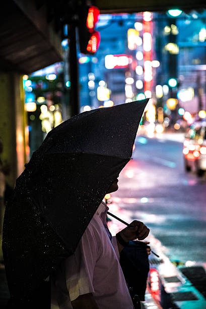 istock Person with umbrella in Tokyo 476342546