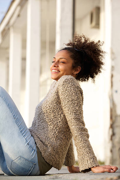 istock Happy woman relaxing outside 476347822