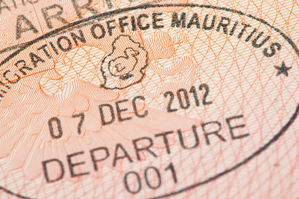 istock Passport page with Mauritius immigration control stamp with Dodo bird. 476348186