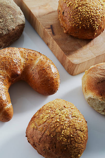 istock different kinds of bread and a cutting board 476350047