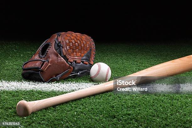 Baseball With Mitt And Bat On Green Grass At Night Stock Photo - Download Image Now - Baseball Bat, Grass, Backgrounds