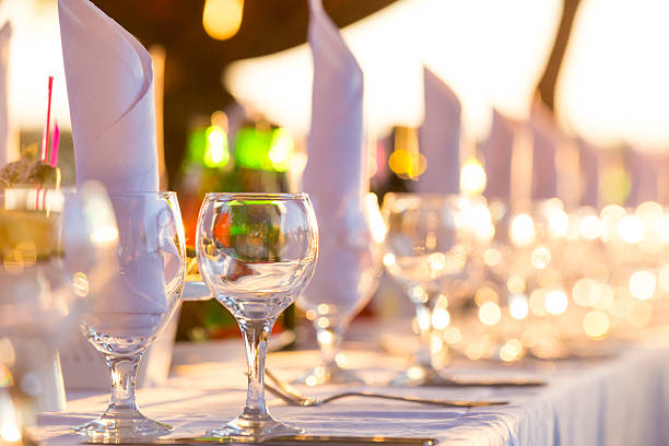 istock Served table for banquet on background of sunset 476352552