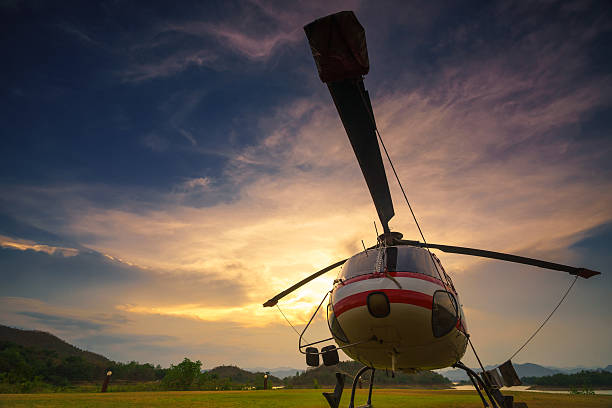 istock Twilight helicopter on the helipad. 476354858