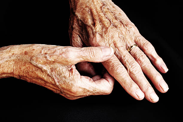 istock old woman has pain in his hands 476355224