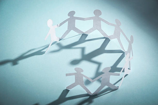 istock Group of people holding hands 476355294
