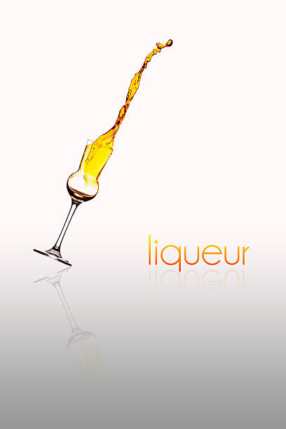liqueur splash background stock photo