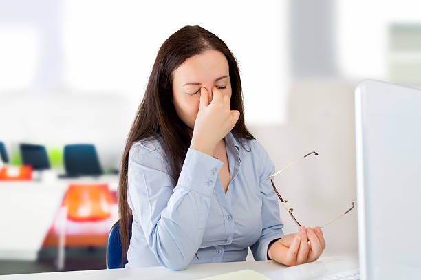 istock eyestrain in the office 476359108