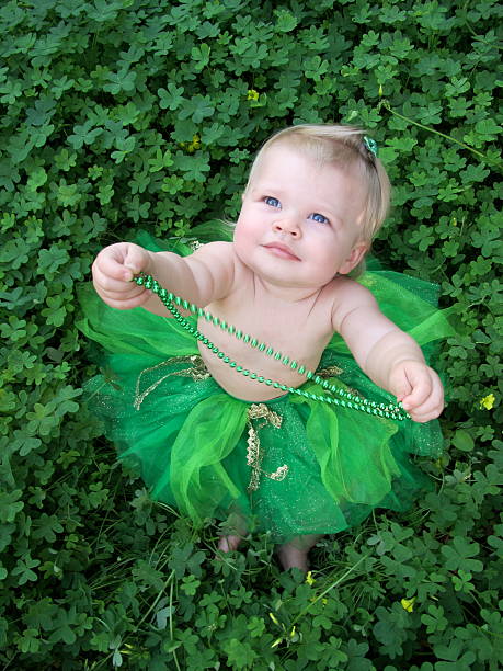 St. Patty's Day Baby Girl in Clovers stock photo