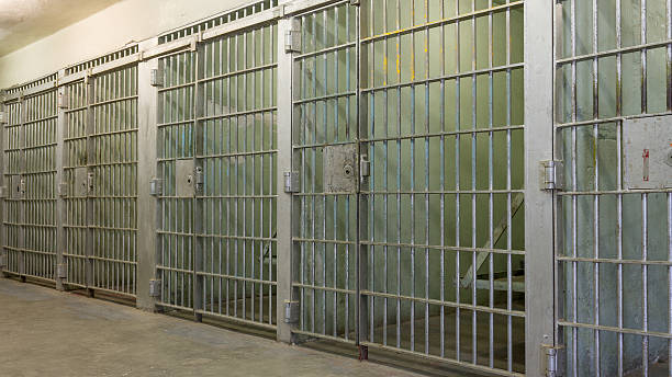 istock Bars of a prison with all the doors closed 476362249