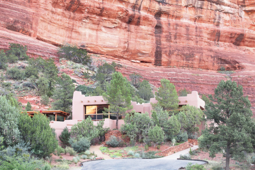 A luxury home nestled into a red rock canyon setting.  Sedona, Arizona, 2013.